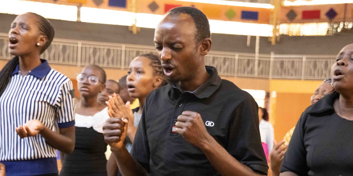 Young people worshipping together during a JCC service